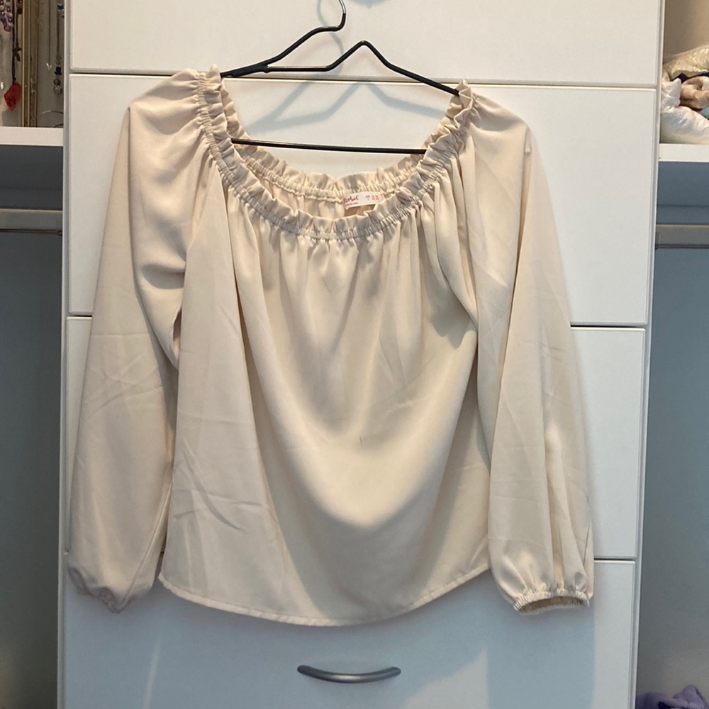 Cream off the shoulder shirt